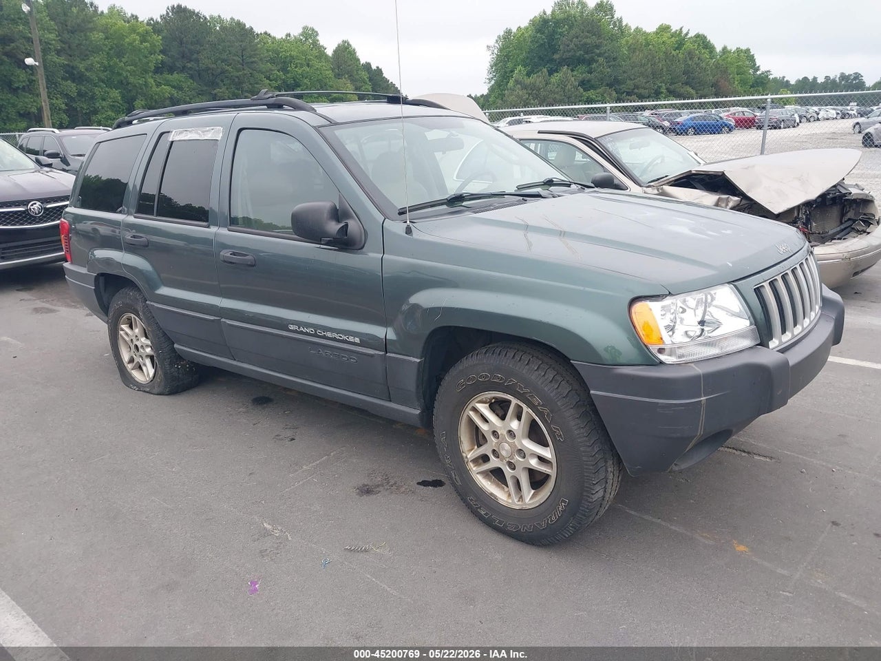 1J4GW48S44C****** · 2004 JEEP GRAND CHEROKEE LAREDO