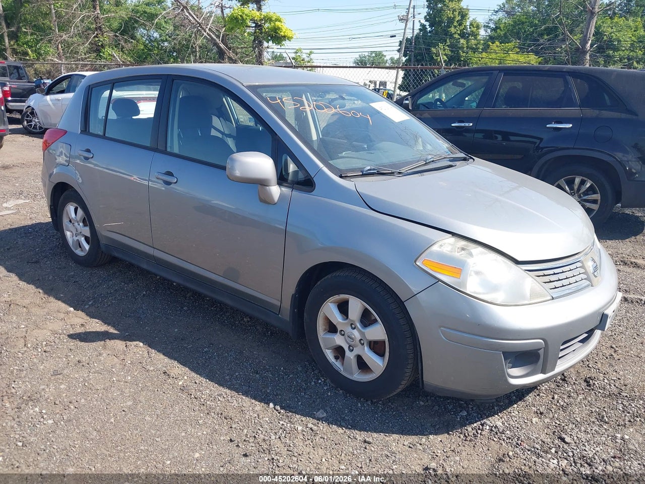 3N1BC13E59L****** · 2009 NISSAN VERSA 1.8SL