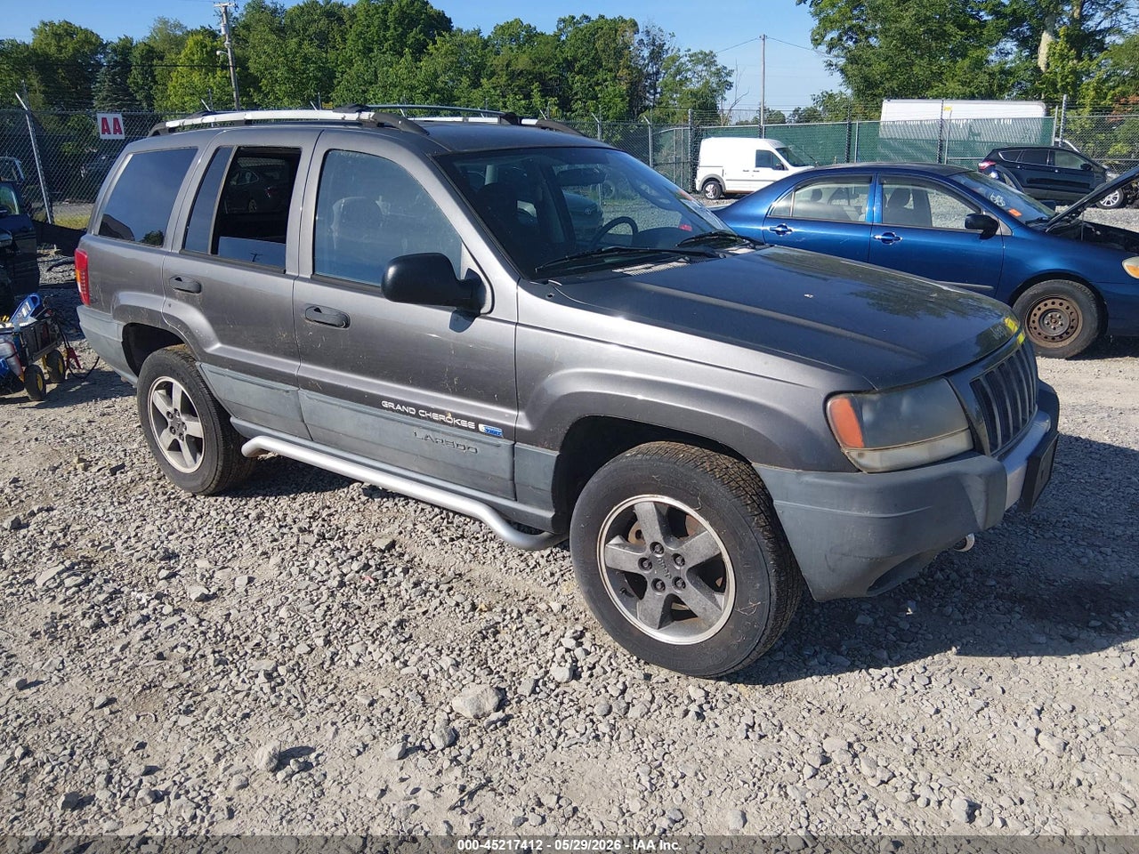 1J4GW48S94C****** · 2004 JEEP GRAND CHEROKEE LAREDO