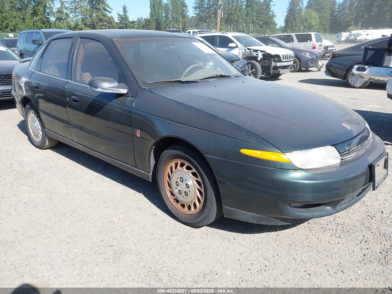 1G8JU52F6YY****** · 2000 SATURN LS1