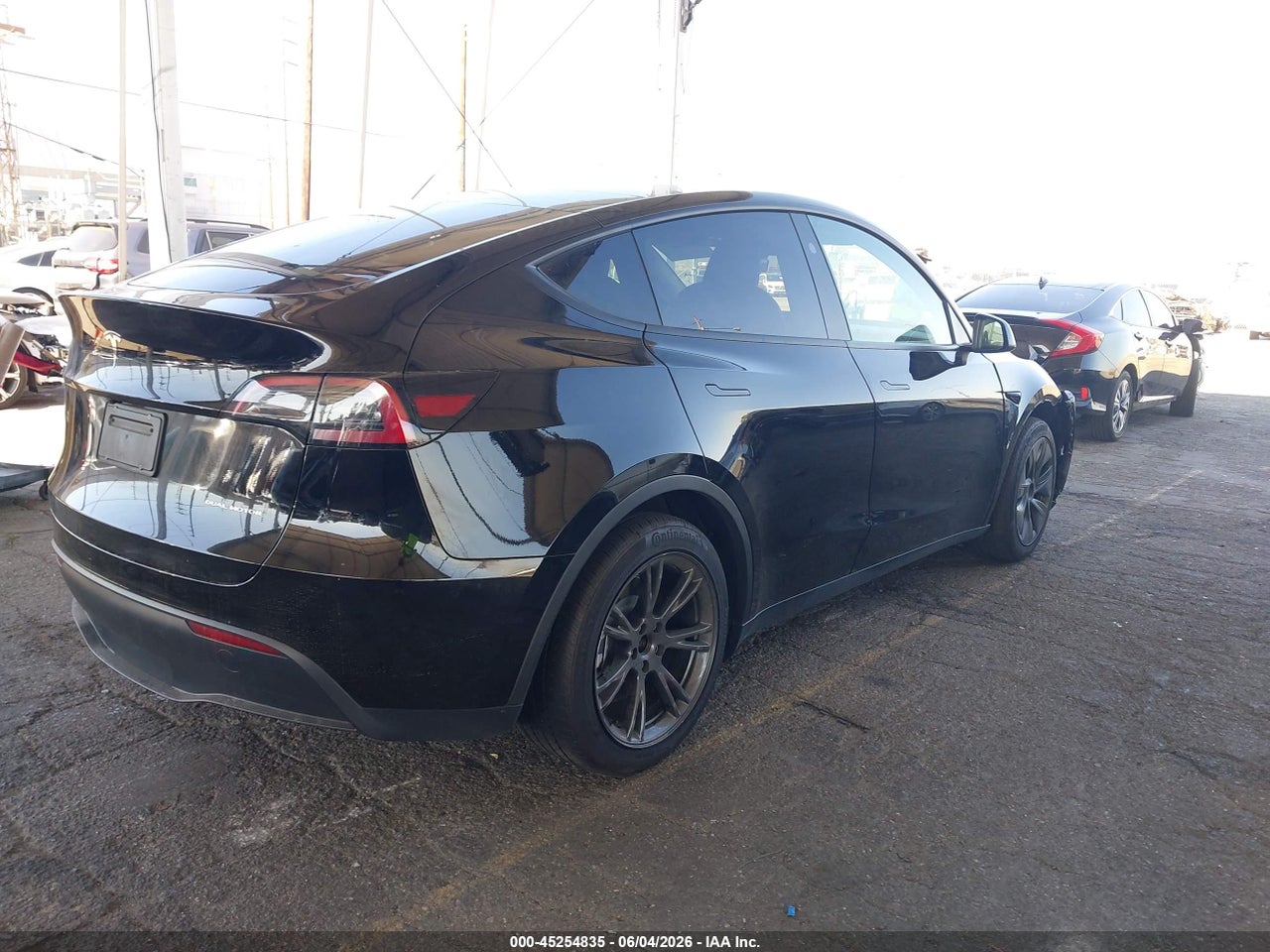 2025 TESLA MODEL Y LONG RANGE DUAL MOTOR ALL-WHEEL DRIVE · 4/9
