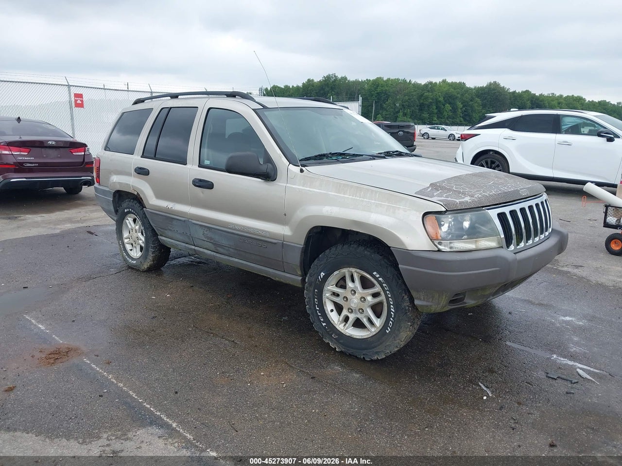 1J4GW48S13C****** · 2003 JEEP GRAND CHEROKEE LAREDO