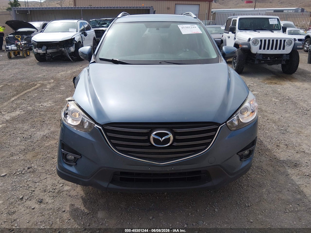 JM3KE2CY2G0****** · 2016 MAZDA CX-5 TOURING · 6/11