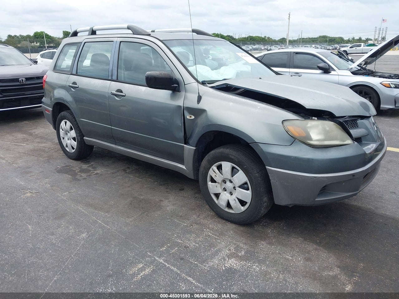 JA4LX31G03U****** · 2003 MITSUBISHI OUTLANDER LS