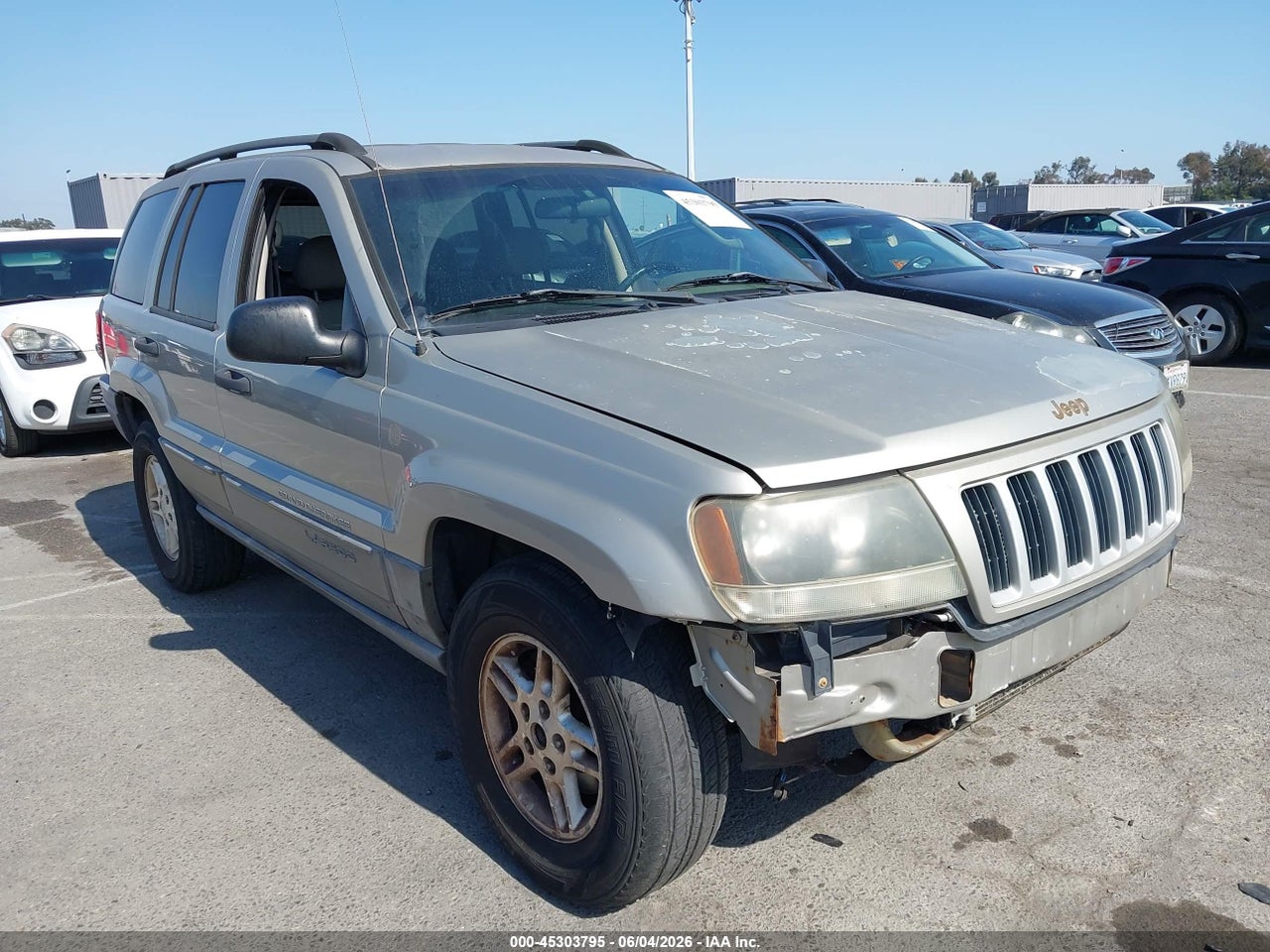 1J4GW48S04C****** · 2004 JEEP GRAND CHEROKEE LAREDO
