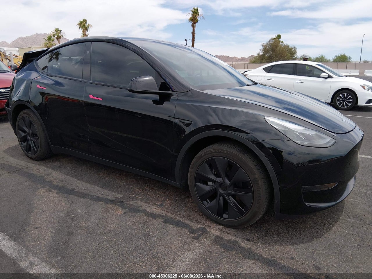 7SAYGDED9SF****** · 2025 TESLA MODEL Y LONG RANGE DUAL MOTOR REAR-WHEEL DRIVE