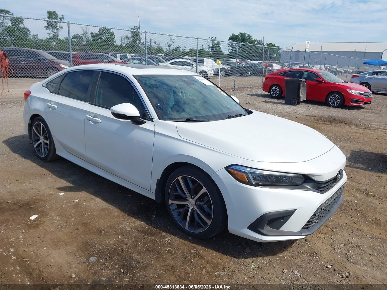 2HGFE1F94NH****** · 2022 HONDA CIVIC TOURING