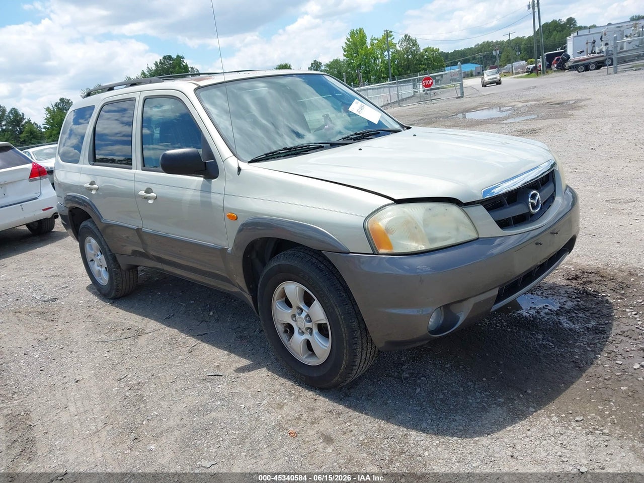 4F2CZ96144K****** · 2004 MAZDA TRIBUTE ES V6