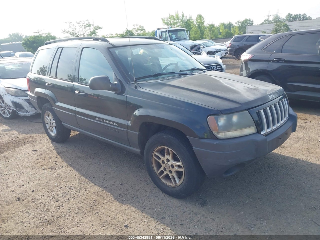 1J4GW48S74C****** · 2004 JEEP GRAND CHEROKEE LAREDO