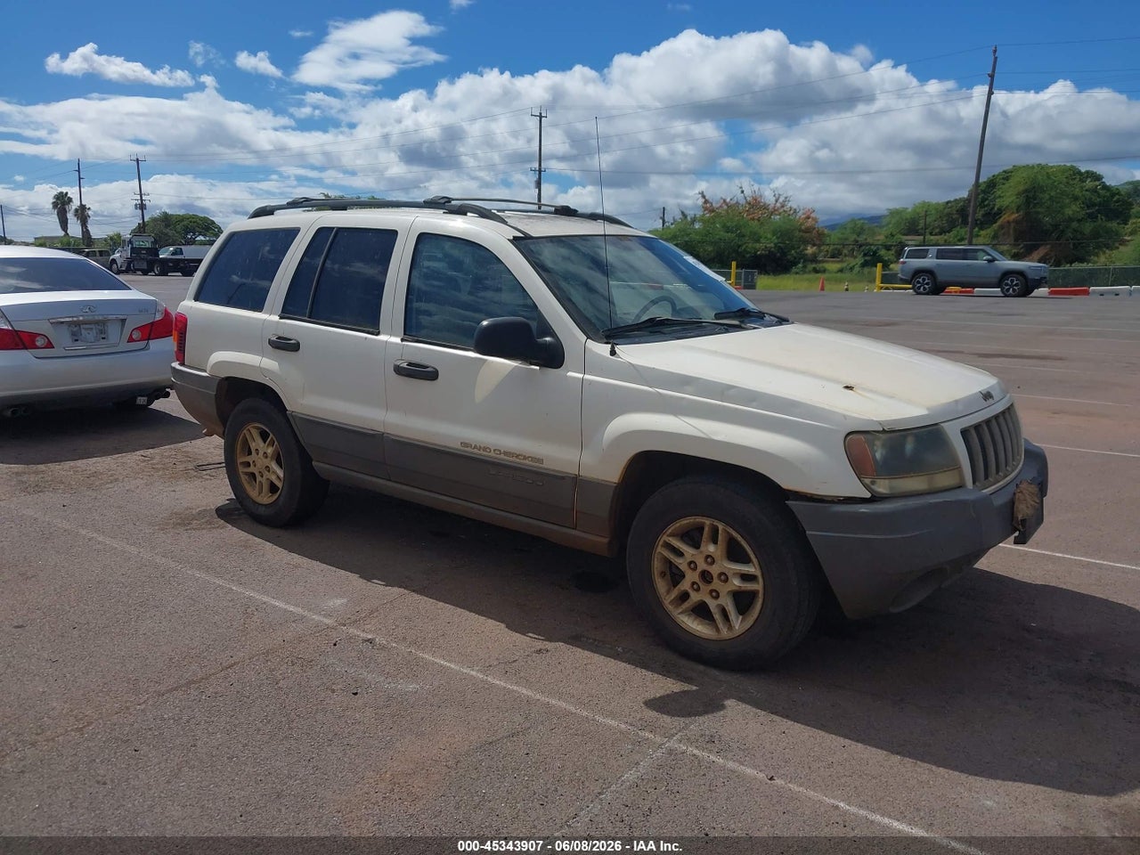 1J4GW48S54C****** · 2004 JEEP GRAND CHEROKEE LAREDO