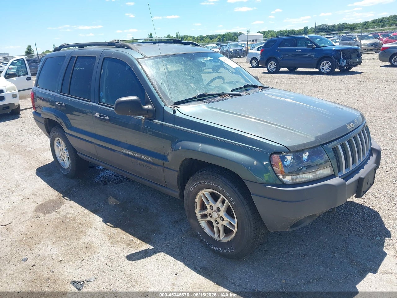 1J4GW48S14C****** · 2004 JEEP GRAND CHEROKEE LAREDO