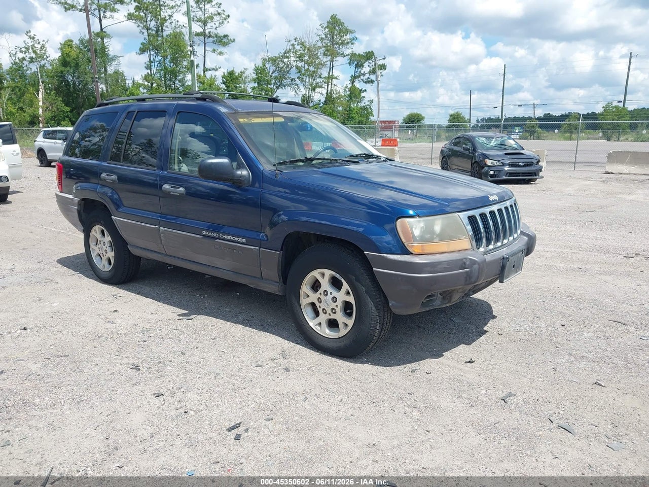 1J4G258S9XC****** · 1999 JEEP GRAND CHEROKEE LAREDO