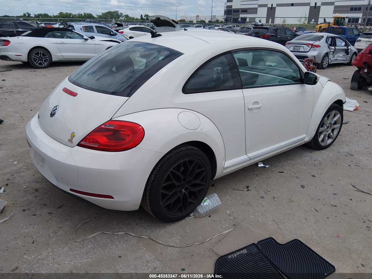 2012 VOLKSWAGEN BEETLE 2.5L · 4/11