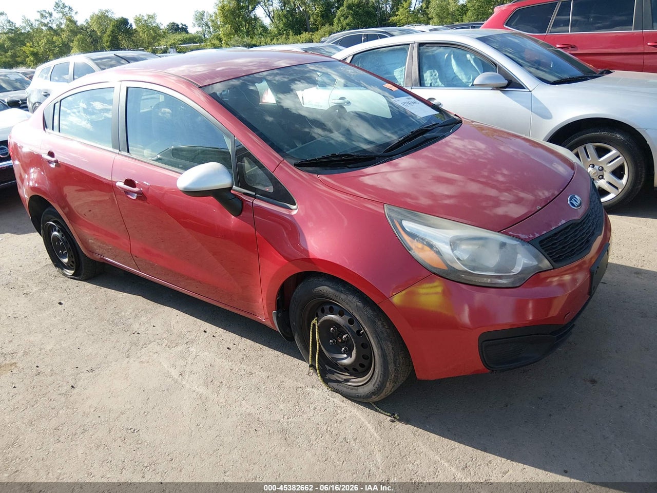 KNADM4A39F6****** · 2015 KIA RIO LX