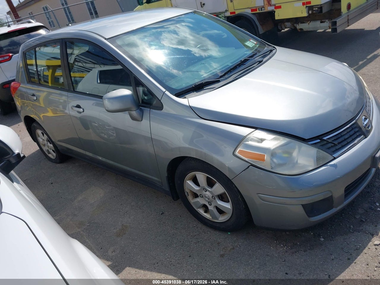 3N1BC13E59L****** · 2009 NISSAN VERSA 1.8SL