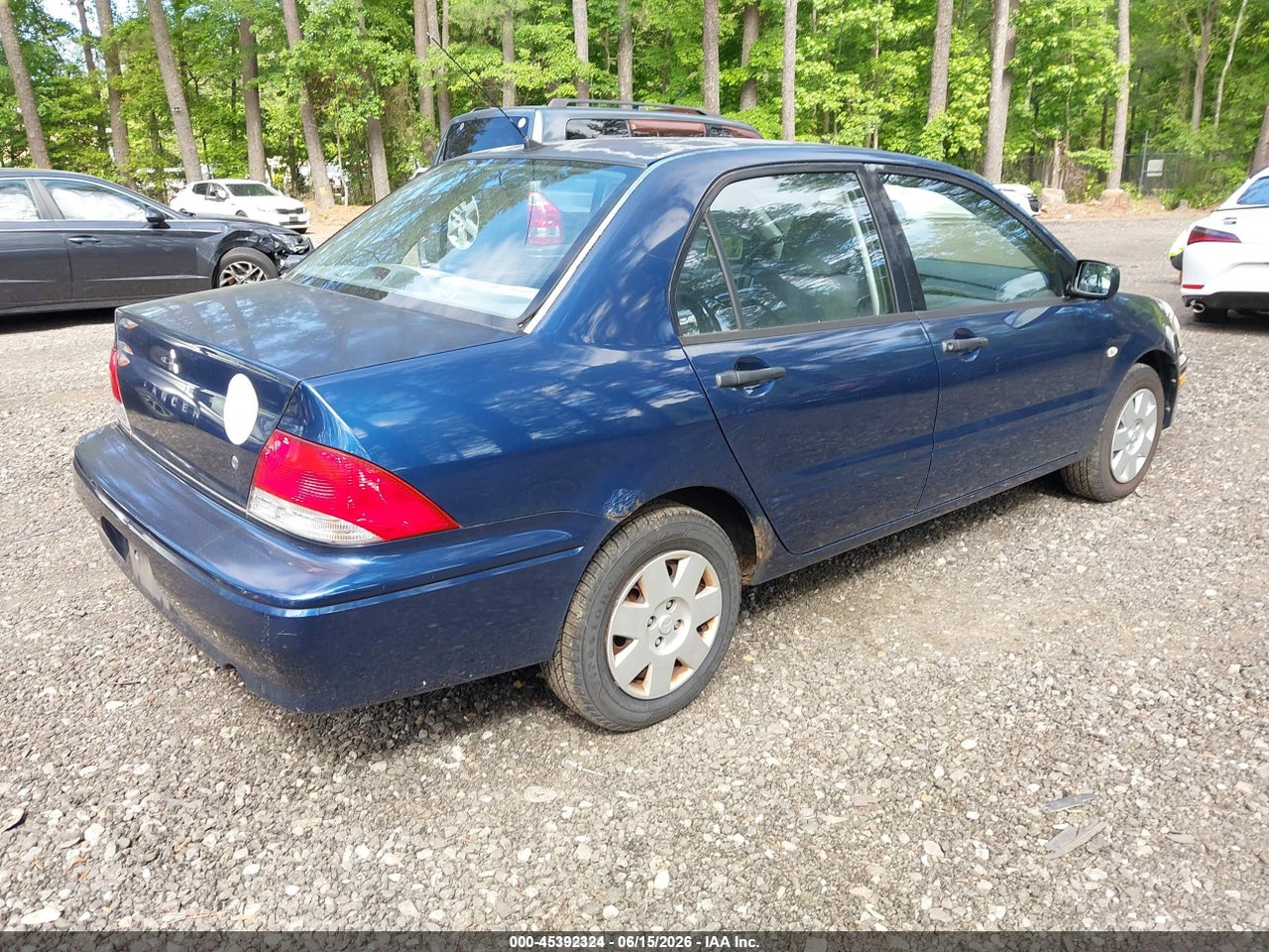 2002 MITSUBISHI LANCER ES · 4/11