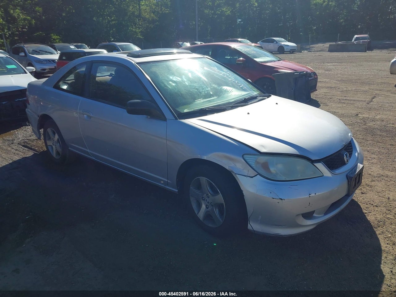 1HGEM22994L****** · 2004 HONDA CIVIC EX