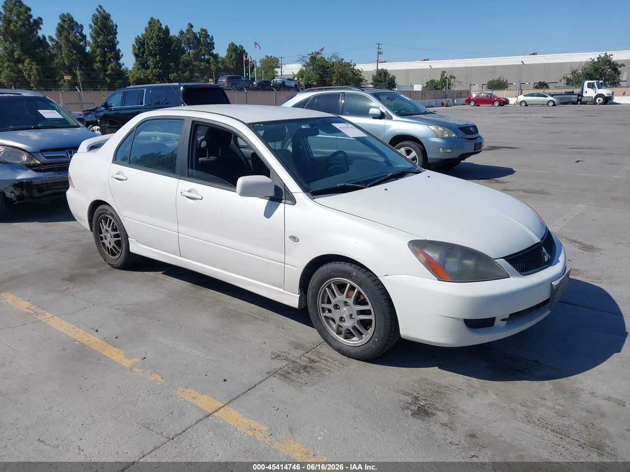 JA3AJ86E56U****** · 2006 MITSUBISHI LANCER OZ RALLY
