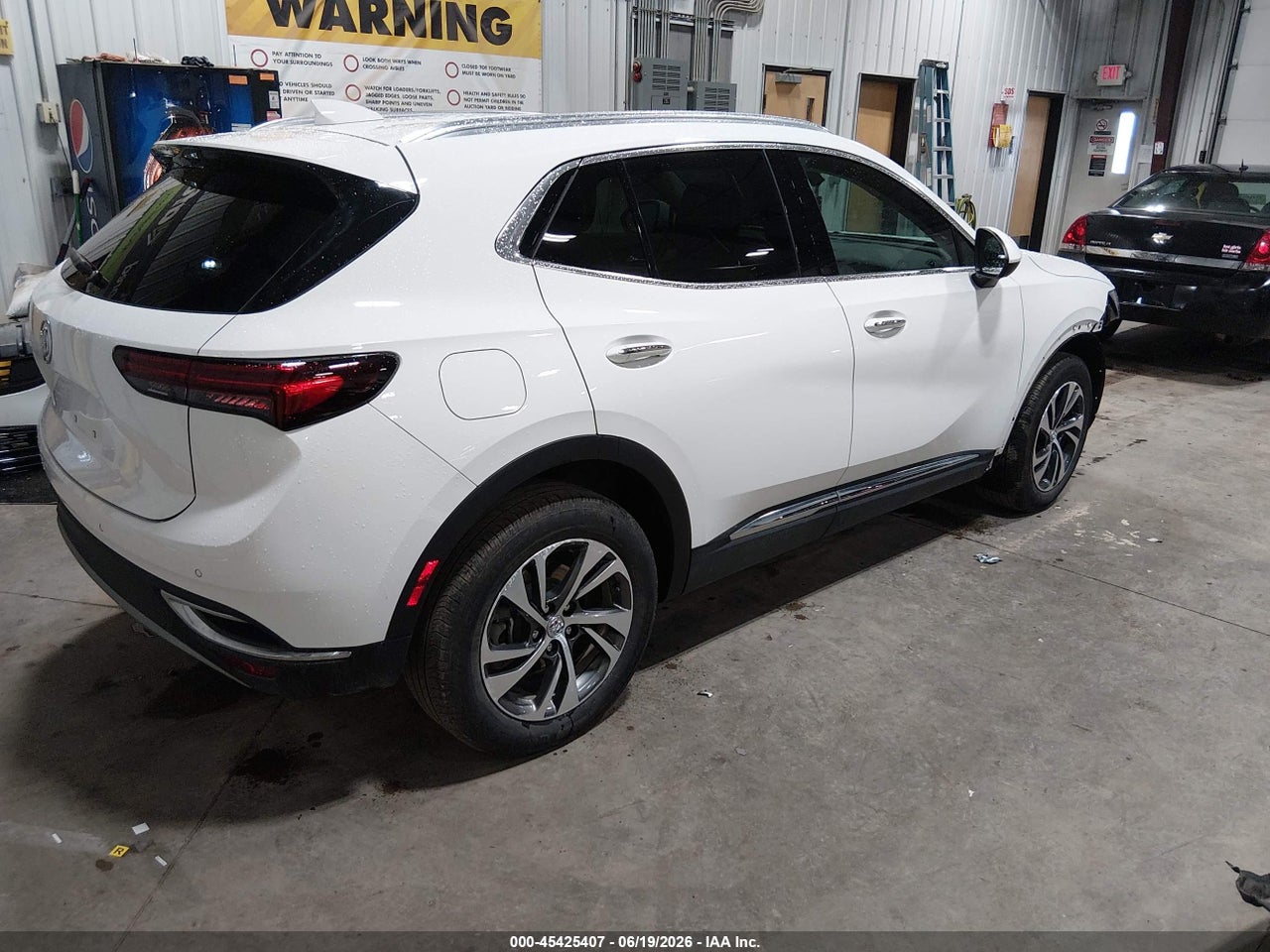 2023 BUICK ENVISION ESSENCE AWD · 4/11