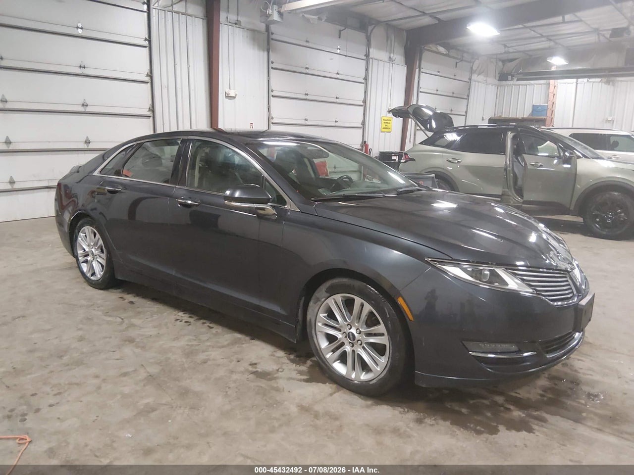 3LN6L2G98ER****** · 2014 LINCOLN MKZ