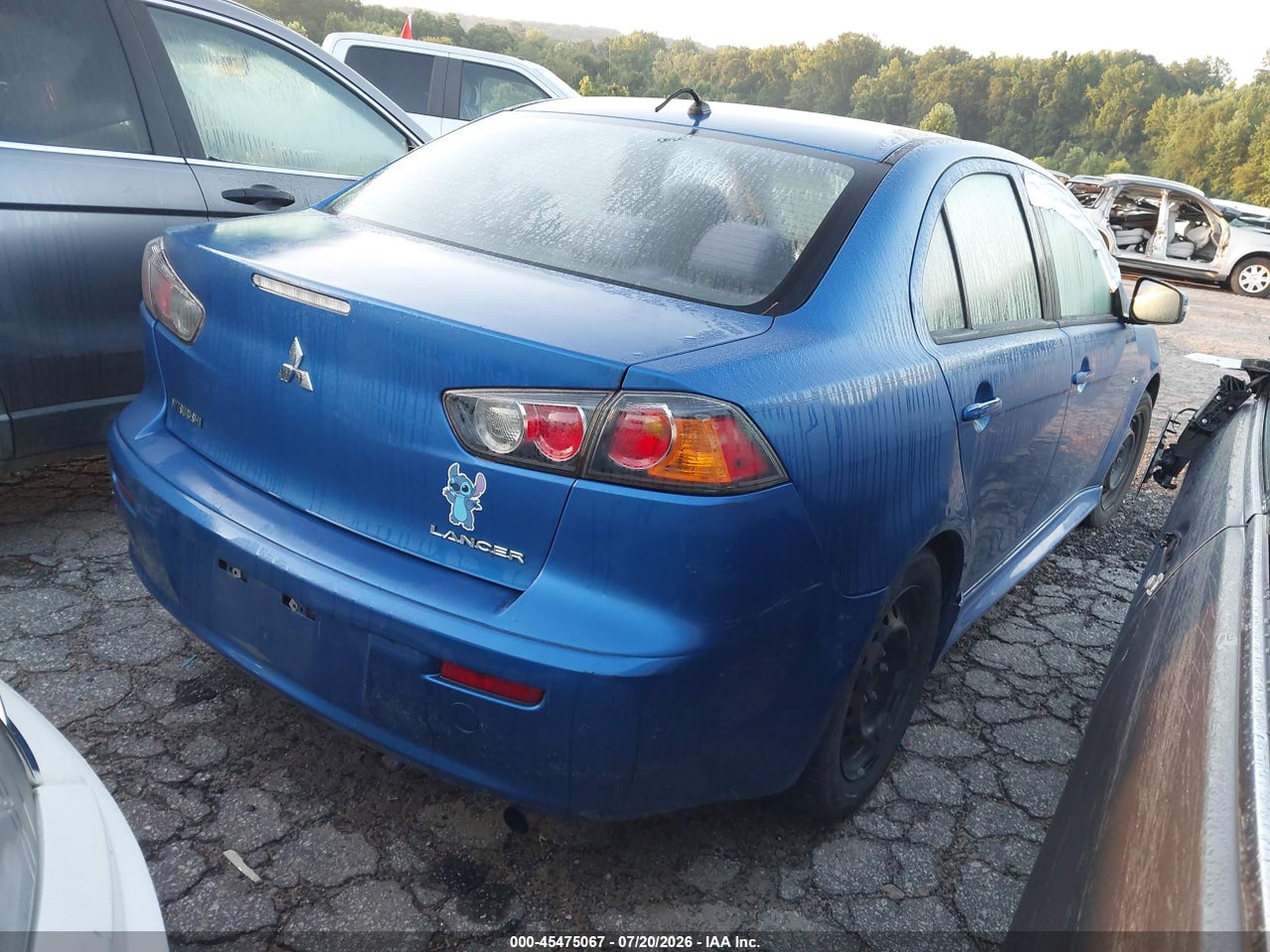 2015 MITSUBISHI LANCER ES · 4/11