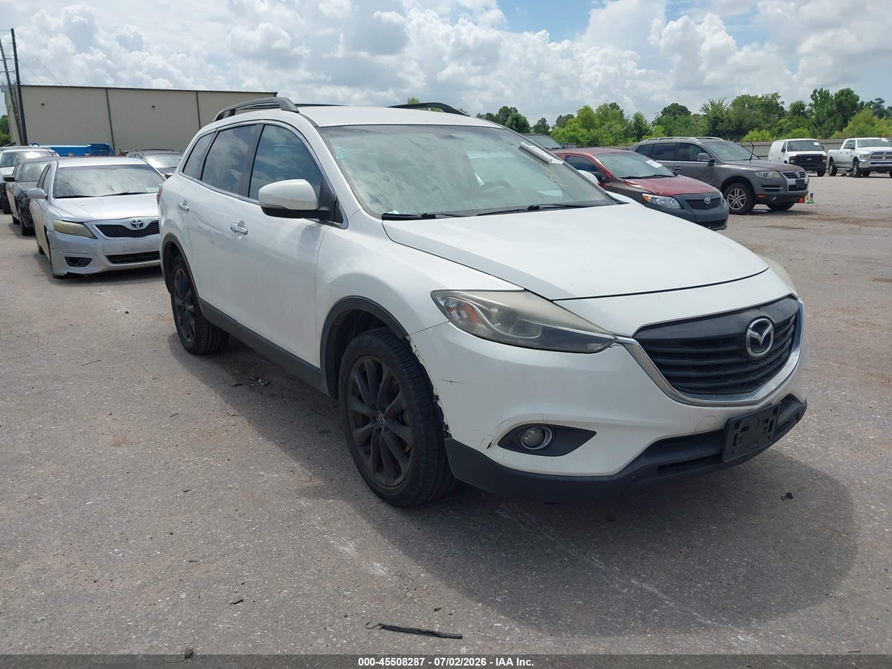 JM3TB3DA1F0****** · 2015 MAZDA CX-9 GRAND TOURING