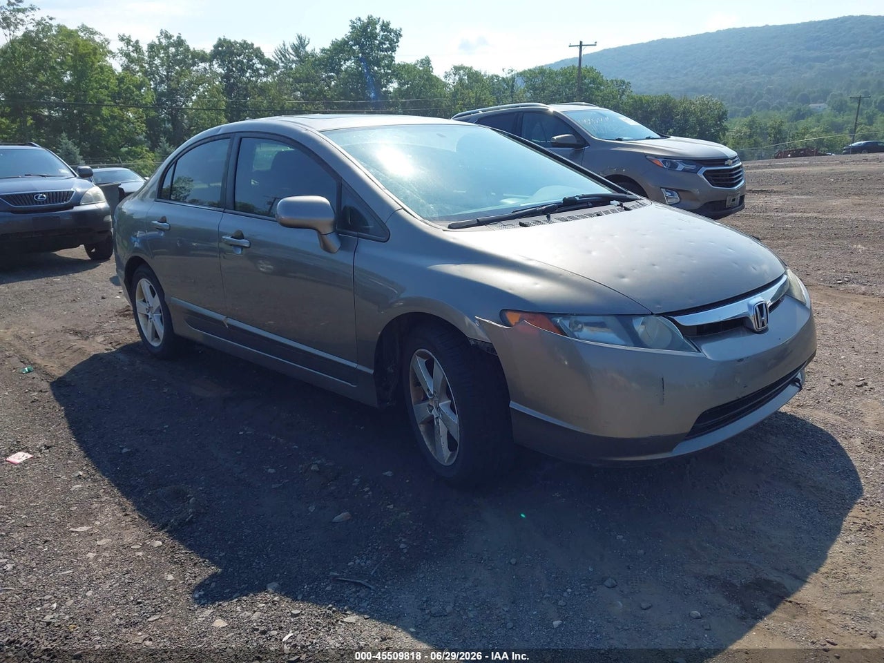1HGFA168X6L****** · 2006 HONDA CIVIC EX