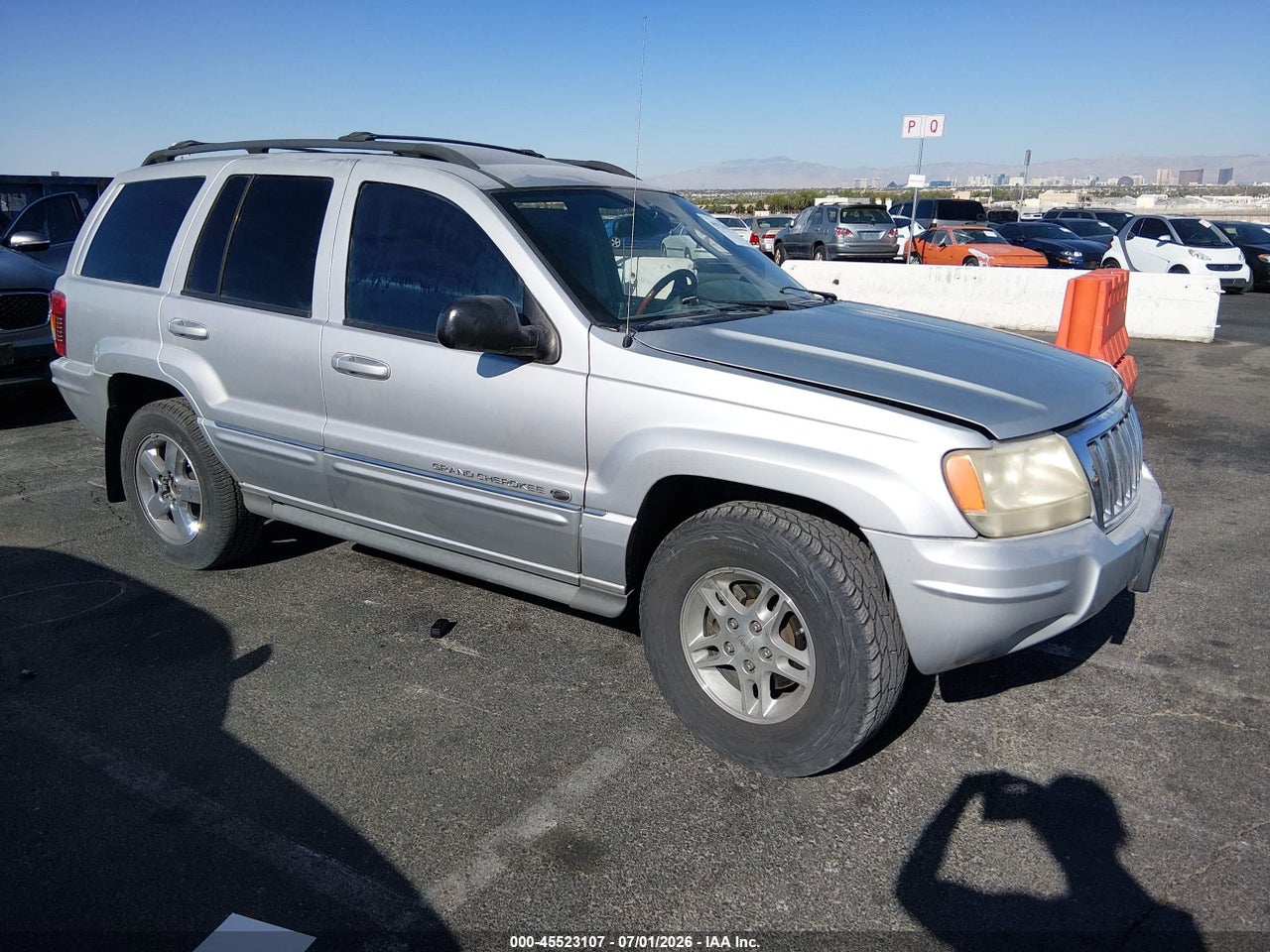 1J8GW68J14C****** · 2004 JEEP GRAND CHEROKEE OVERLAND