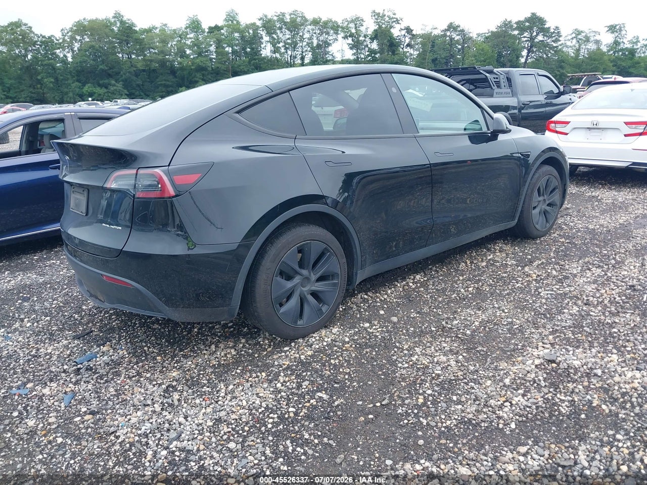 2025 TESLA MODEL Y LONG RANGE DUAL MOTOR ALL-WHEEL DRIVE · 4/11