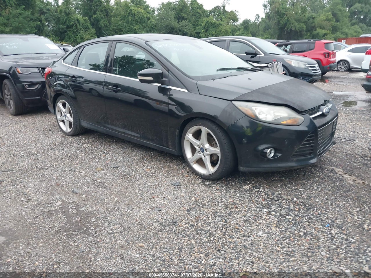 1FAHP3J29CL****** · 2012 FORD FOCUS TITANIUM