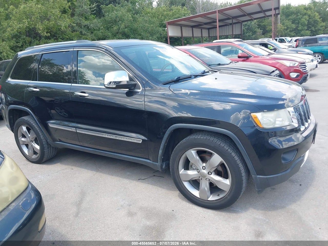 1C4RJECT8DC****** · 2013 JEEP GRAND CHEROKEE OVERLAND