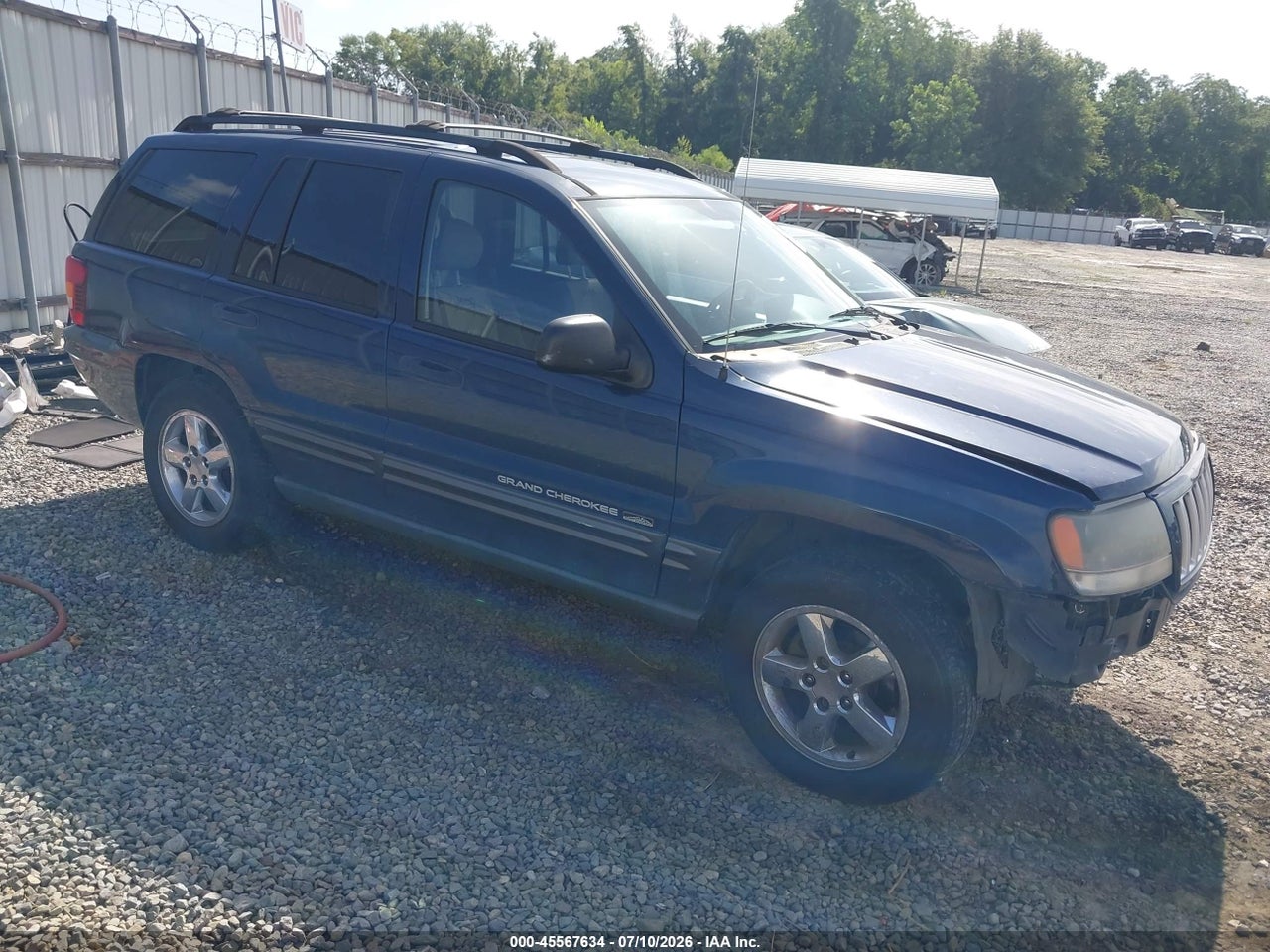 1J4GX48S94C****** · 2004 JEEP GRAND CHEROKEE LAREDO