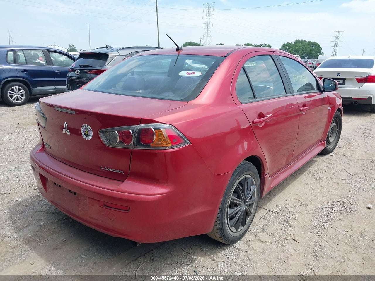 2015 MITSUBISHI LANCER ES · 4/11