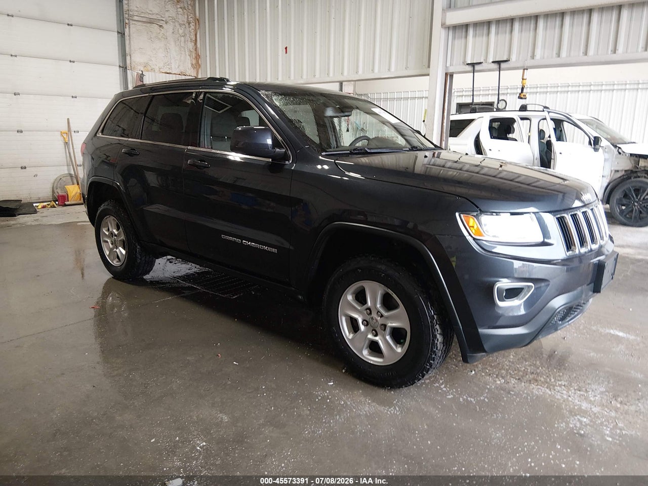 1C4RJFAG2FC****** · 2015 JEEP GRAND CHEROKEE LAREDO