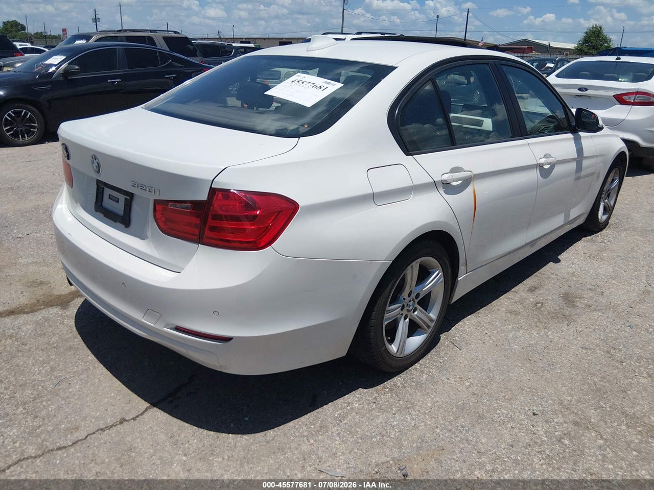 2015 BMW 320I   · 4/11