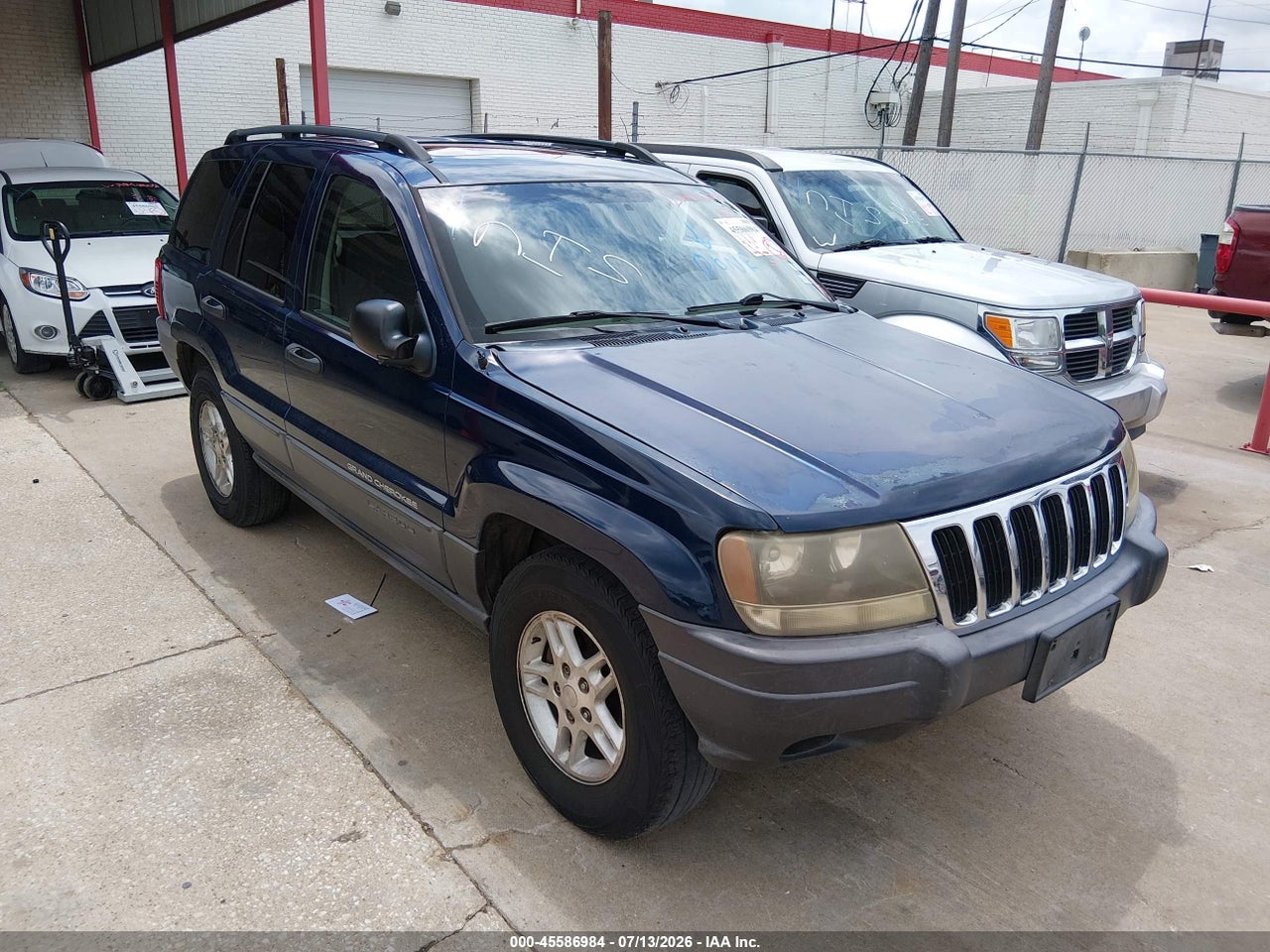 1J4GX48S83C****** · 2003 JEEP GRAND CHEROKEE LAREDO