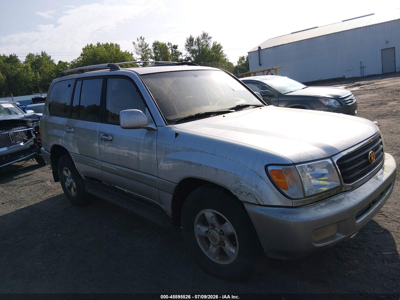 JT3HT05J9X0****** · 1999 TOYOTA LAND CRUISER