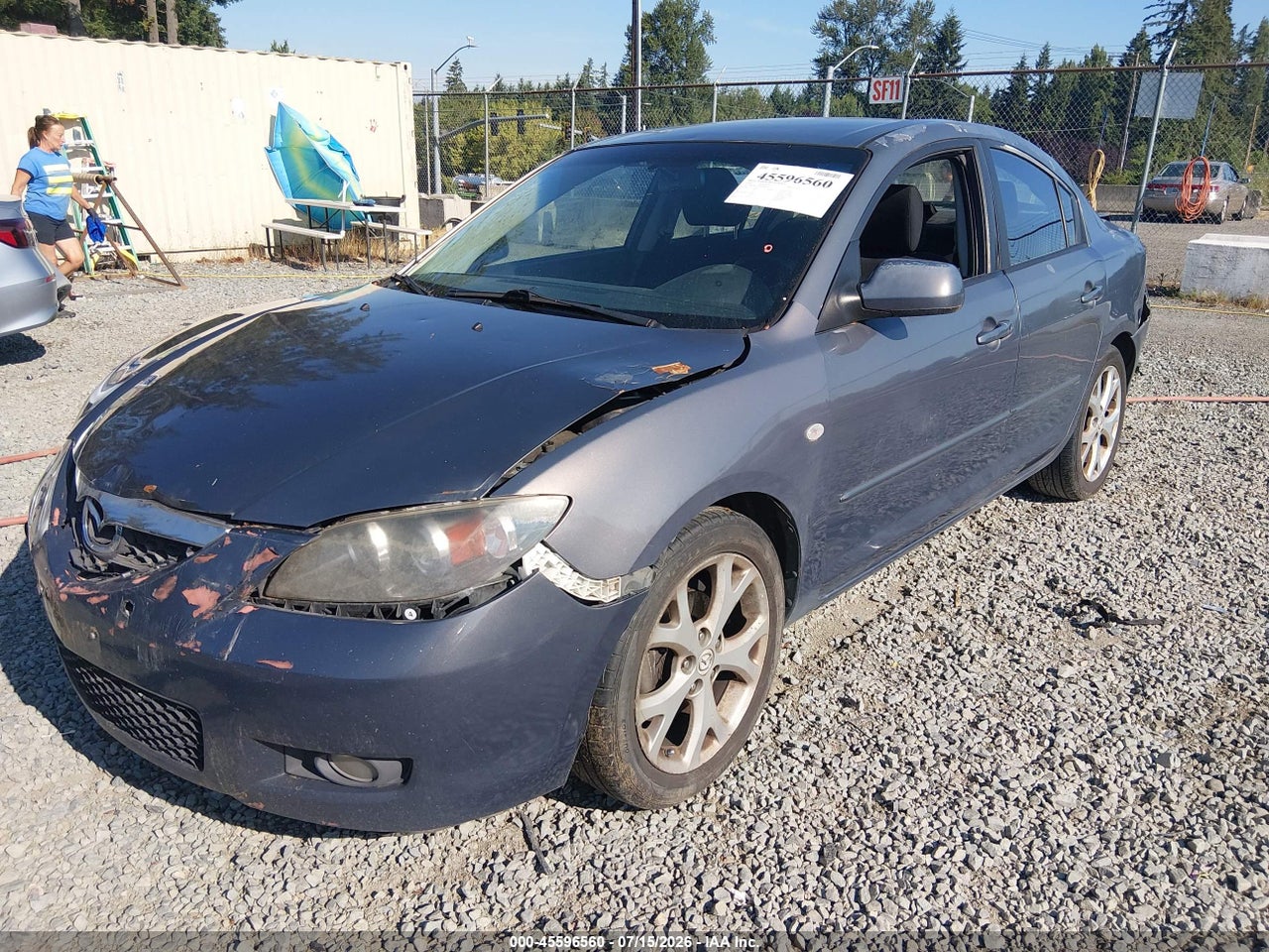 2009 MAZDA MAZDA3 I · 2/11