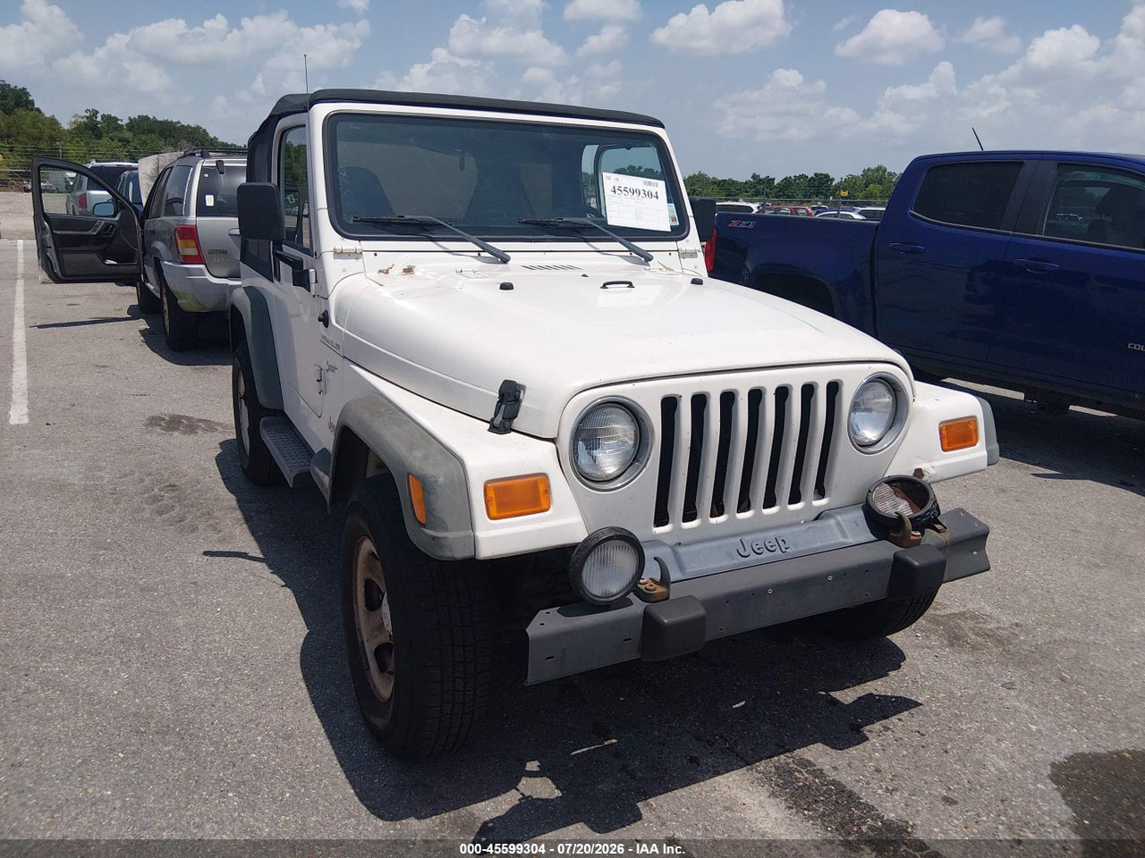 1J4FA49S52P****** · 2002 JEEP WRANGLER SPORT