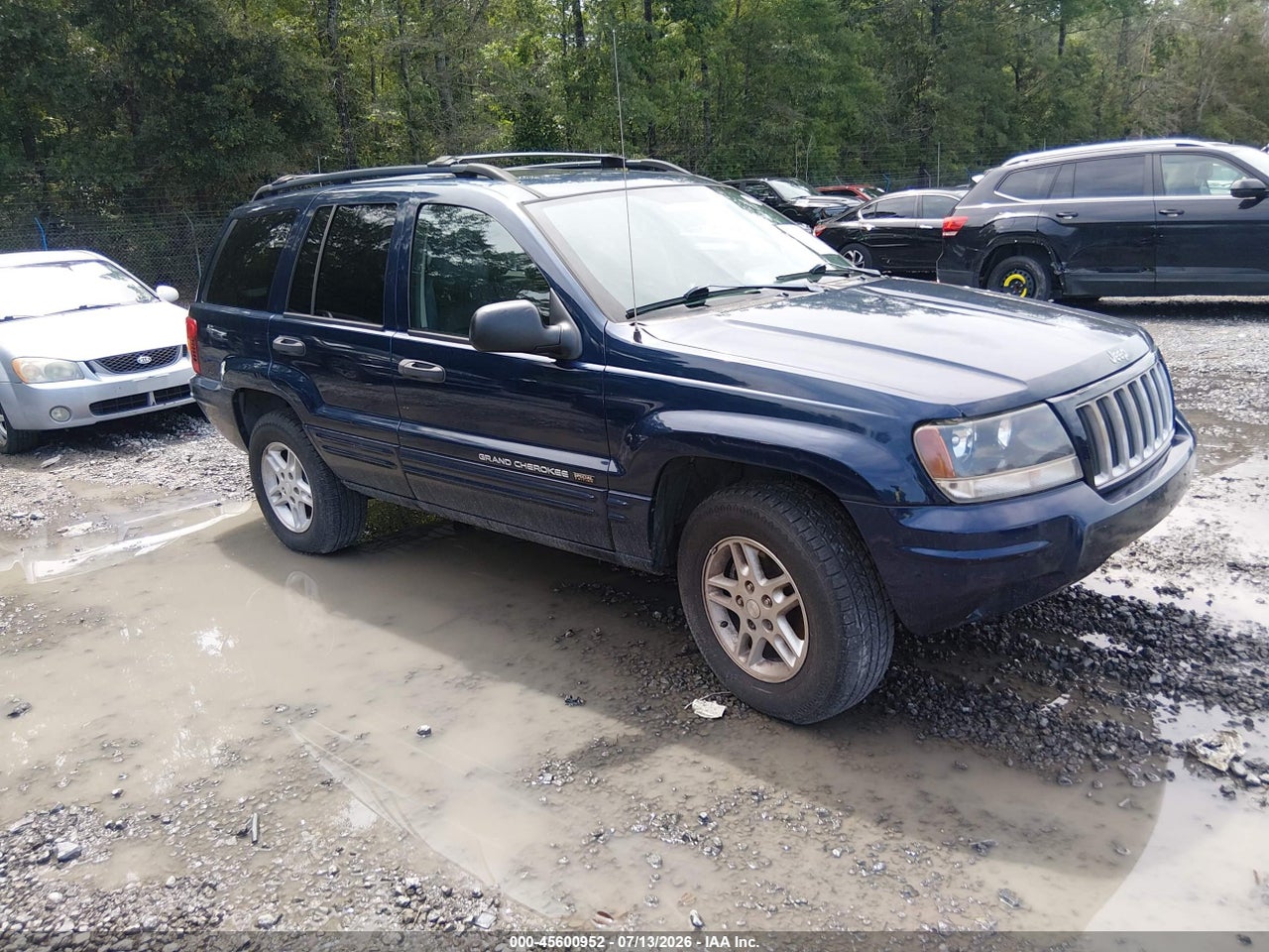 1J4GX48S74C****** · 2004 JEEP GRAND CHEROKEE LAREDO