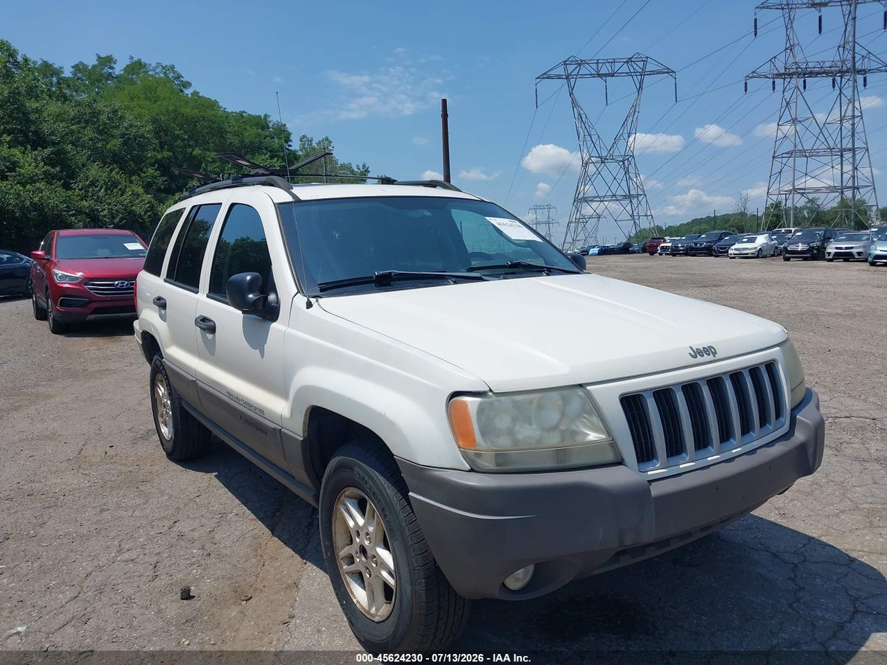 1J8GW48S14C****** · 2004 JEEP GRAND CHEROKEE LAREDO