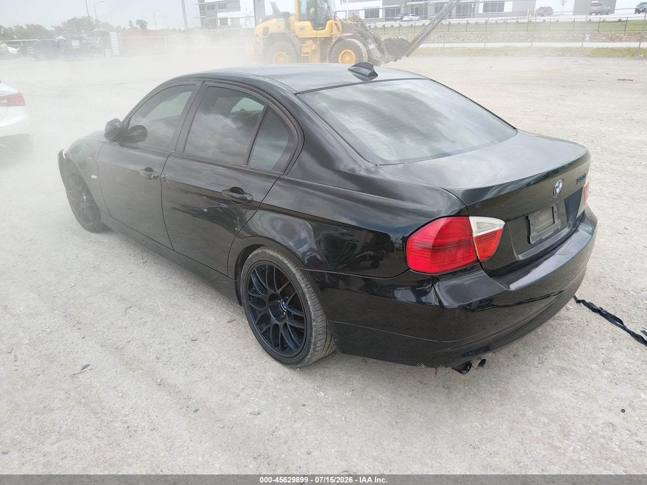2006 BMW 330I   · 3/11