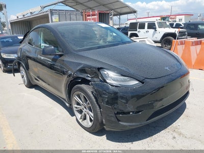7SAYGDEE7NA****** · 2022 TESLA MODEL Y LONG RANGE DUAL MOTOR ALL-WHEEL DRIVE