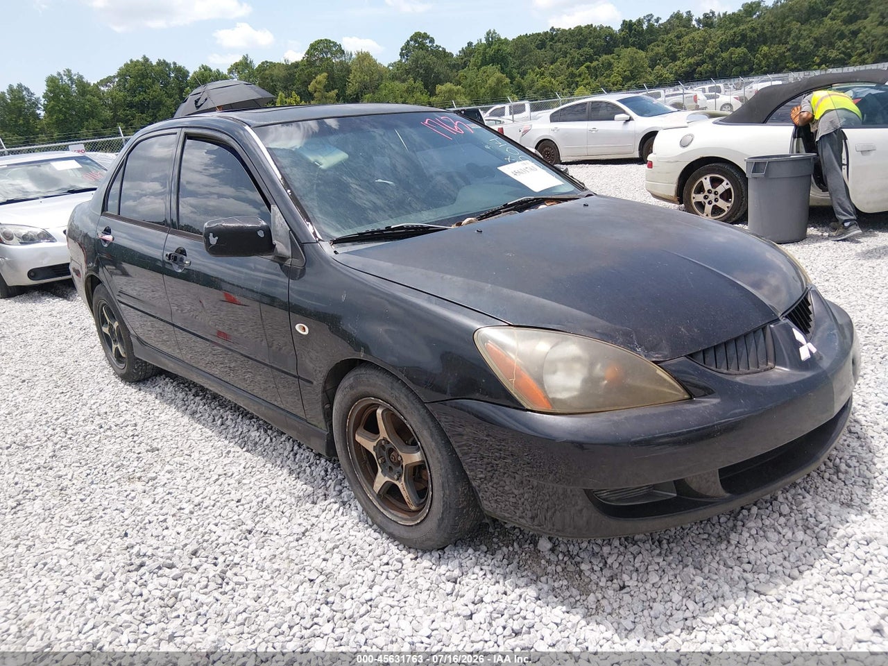 JA3AJ86E54U****** · 2004 MITSUBISHI LANCER OZ RALLY