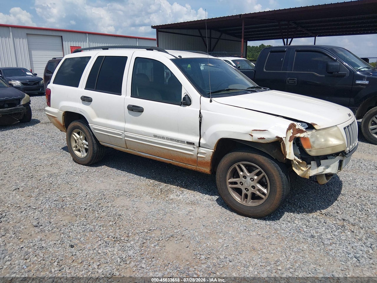 1J4GX48S24C****** · 2004 JEEP GRAND CHEROKEE LAREDO