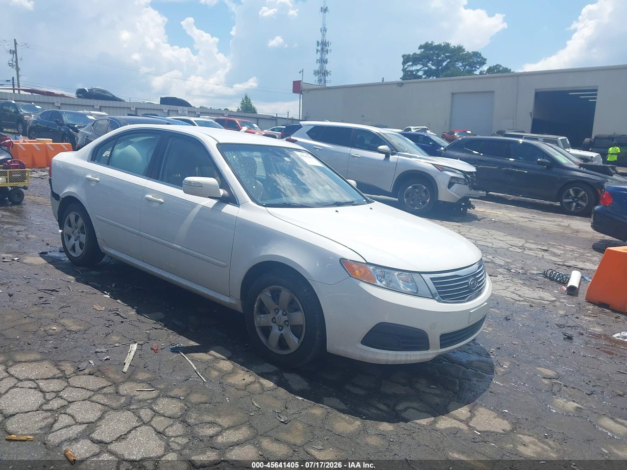 KNAGG4A8XA5****** · 2010 KIA OPTIMA LX
