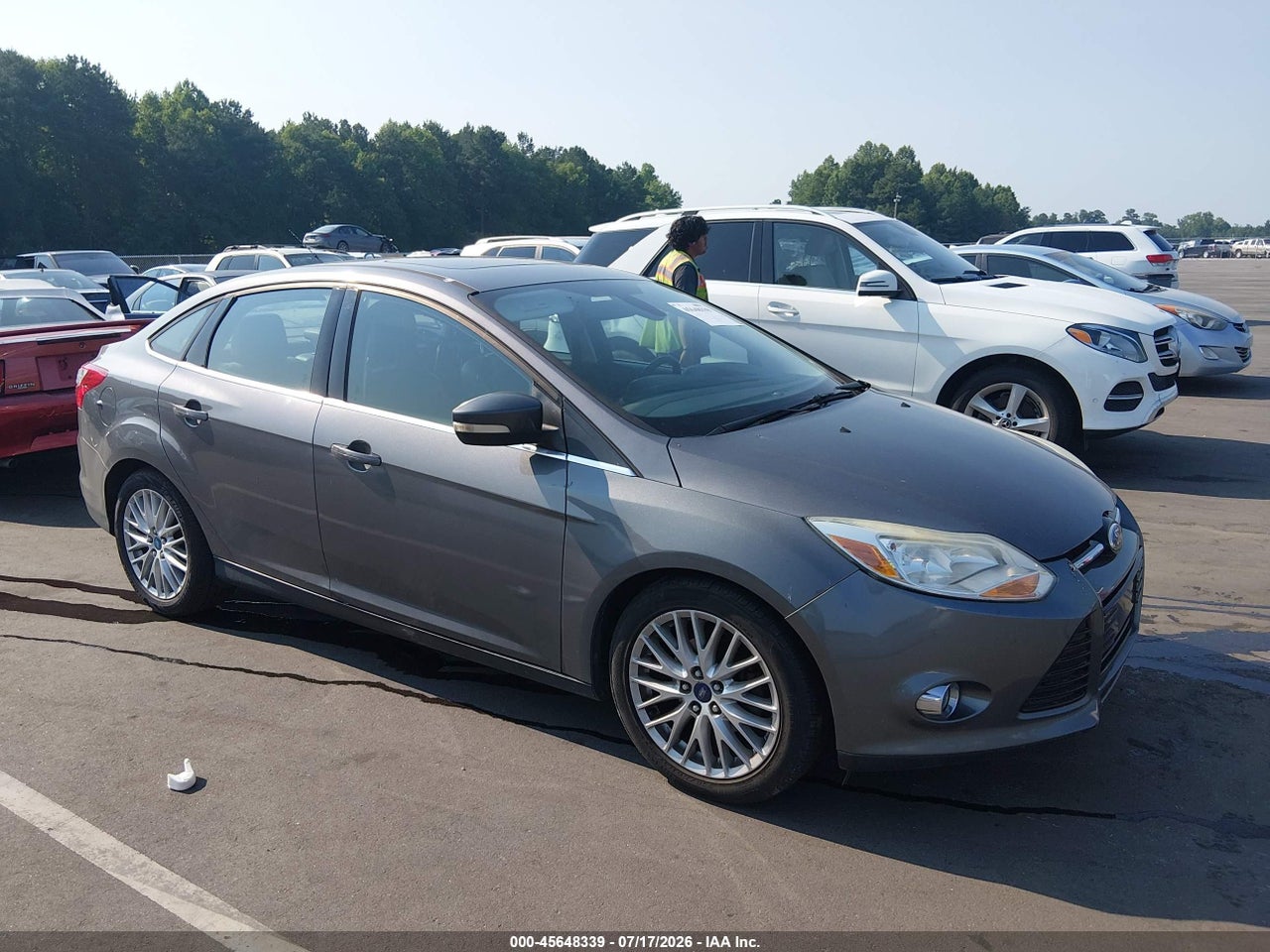 1FAHP3H20CL****** · 2012 FORD FOCUS SEL
