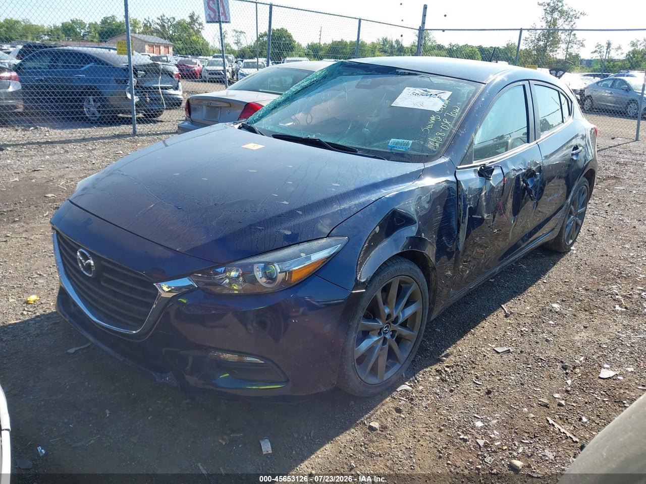 2018 MAZDA MAZDA3 TOURING · 2/4