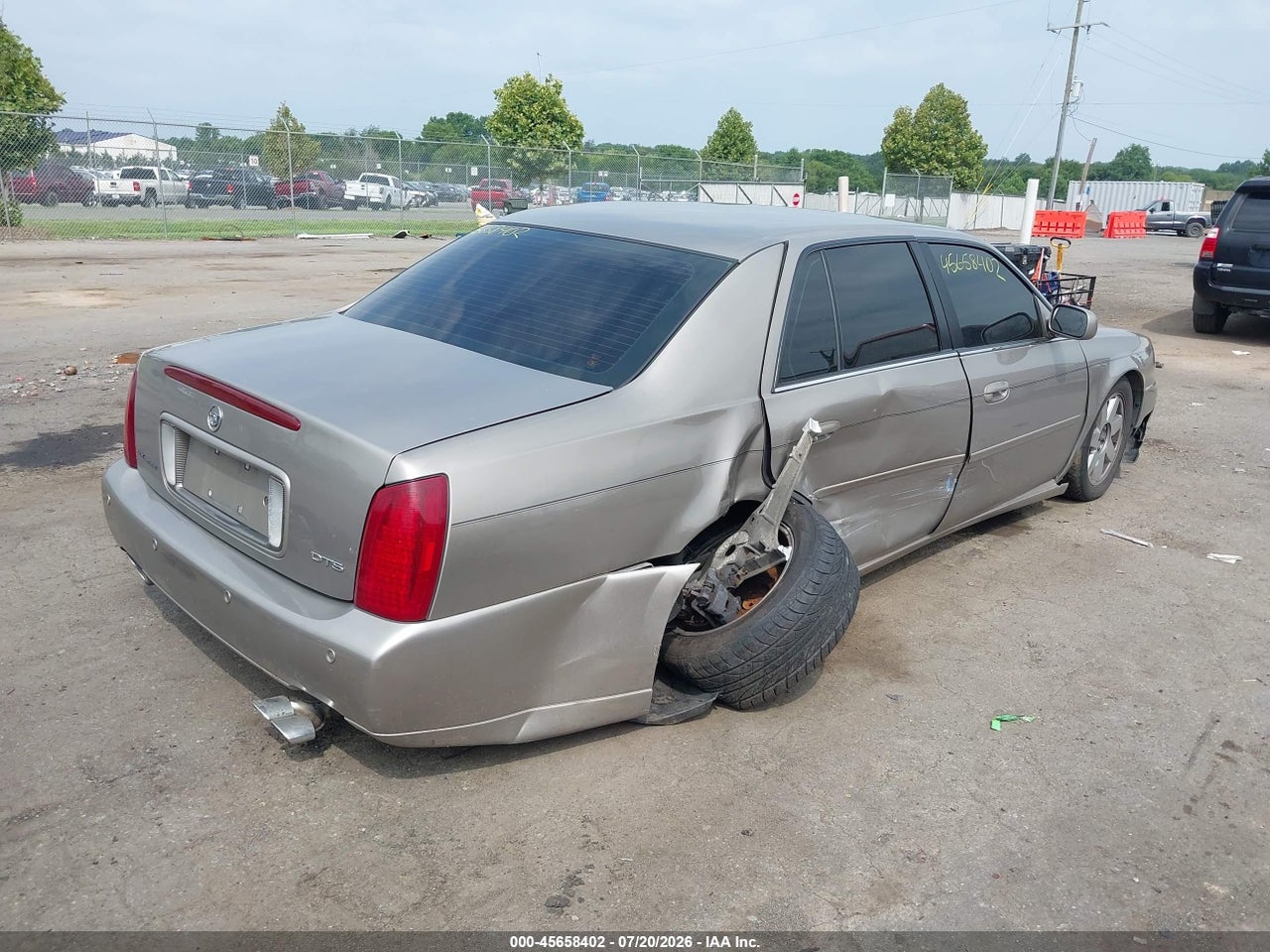 1G6KF57953U****** · 2003 CADILLAC DEVILLE DTS · 4/11