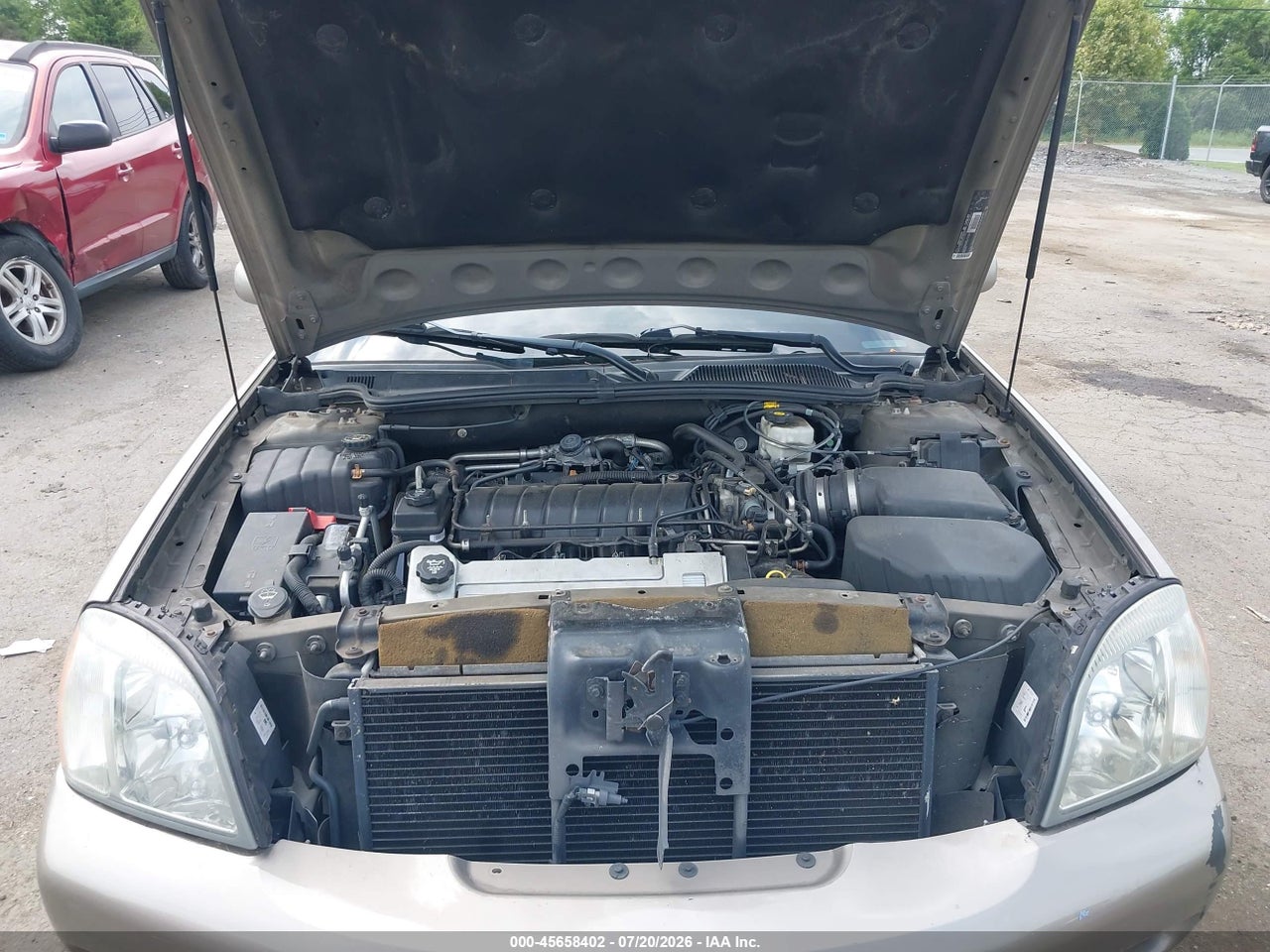 1G6KF57953U****** · 2003 CADILLAC DEVILLE DTS · 10/11